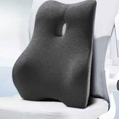 coussin lombaire ergonomique gris posé sur chaise de bureau