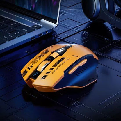 souris gaming sans fil orange sur bureau avec ordinateur