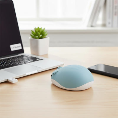 souris sans fil design forme hamster couleur bleue devant ordinateur